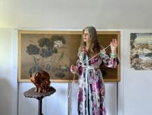 Eleni Sikelianos wearing rag rug dress made by artist Elizabeth Duffy.